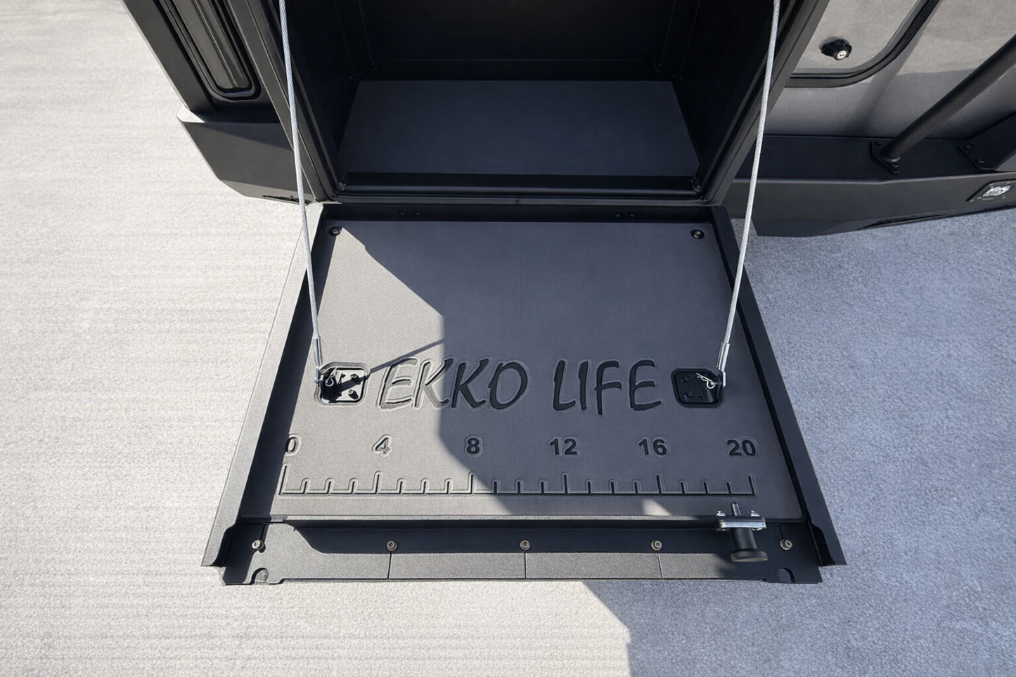 GripTurf custom‑engraved inside door panel for the OWL Monster Box 30 featuring the EKKO LIFE ruler design.