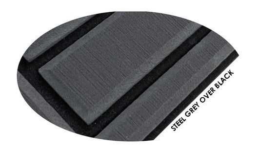 GripTurf steel‑grey‑over‑black EVA‑PE material sample showing layered texture and color contrast.