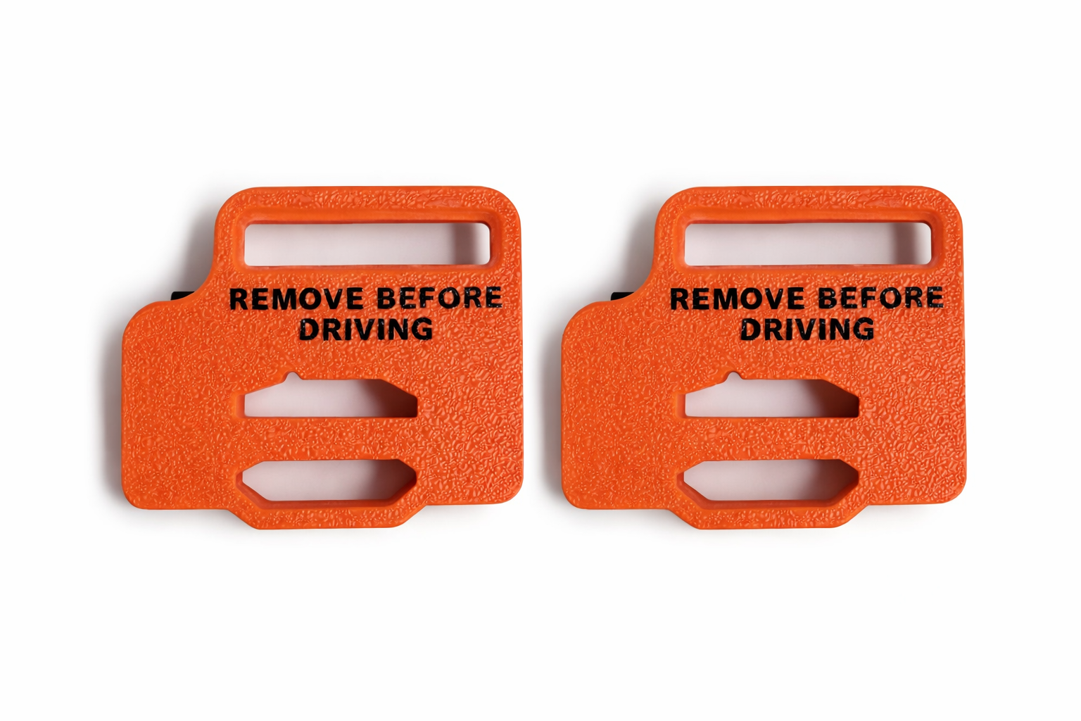 Two EKKO window stays with “Remove Before Driving” text shown side by side on white background