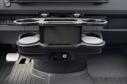 GripTurf Dash Port installed in the Mercedes Sprinter EKKO center console for added cup and gear storage.