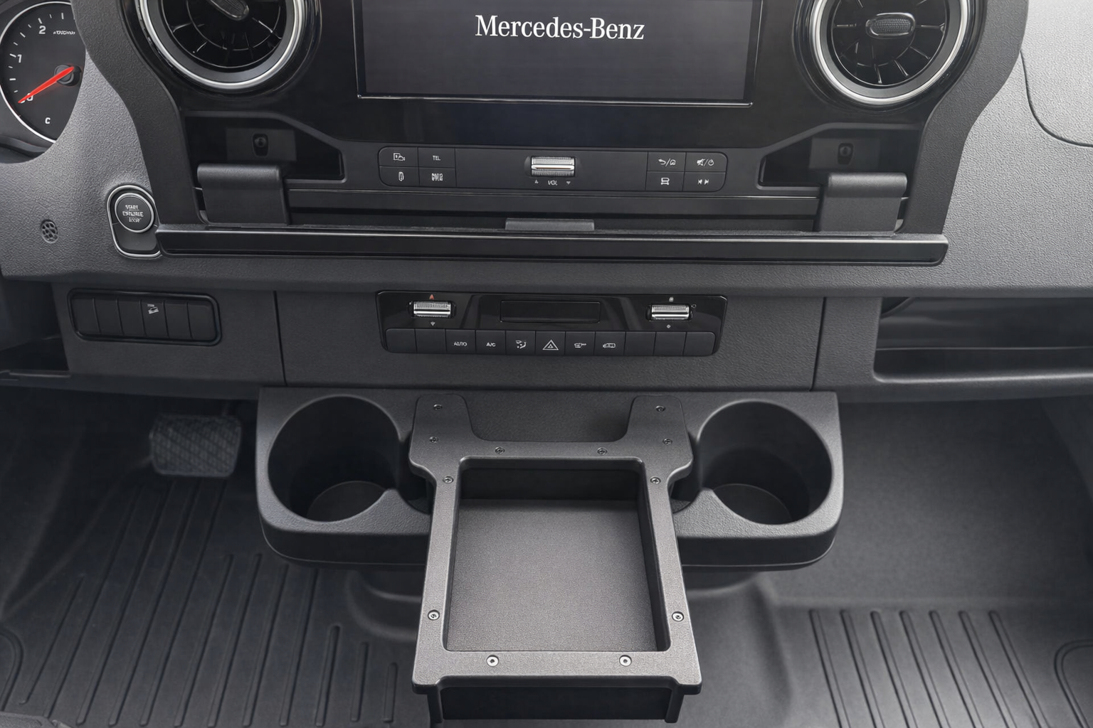 GripTurf Dash Cubby installed in the Sprinter EKKO center console for added storage and organization.