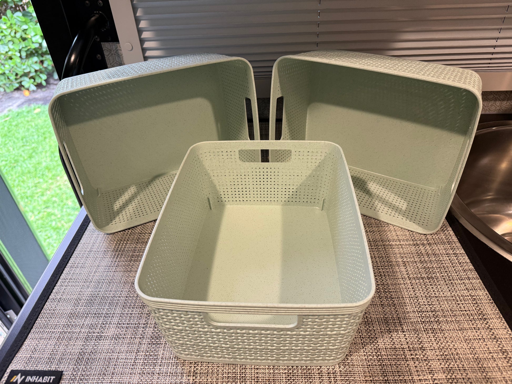 GripTurf green storage baskets for RV and van organization shown in a three‑basket set.