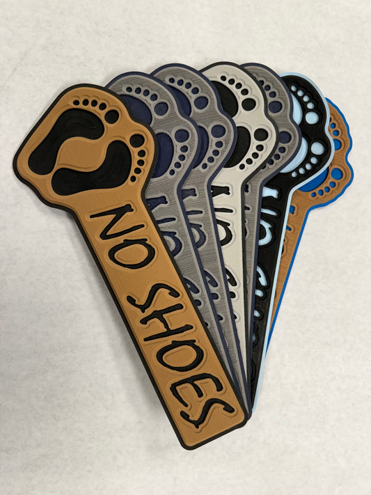 GripTurf No Shoes Pad Set with 3M adhesive in multiple colors, featuring routed NO SHOES lettering.