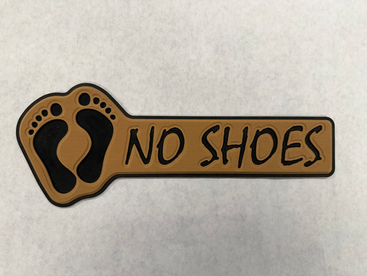 GripTurf No Shoes Pad in teak over black with routed NO SHOES lettering and 3M adhesive.