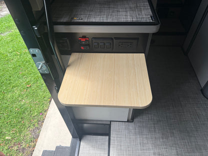 GripTurf Natural Bamboo Folding Countertop Extension installed in the Winnebago EKKO, shown in the upright position.