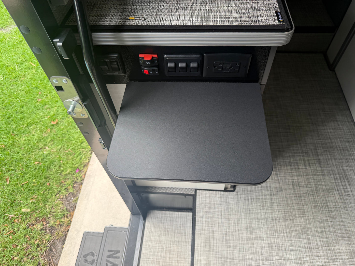 GripTurf black marine‑grade Starboard countertop extension in the EKKO shown in the up position.
