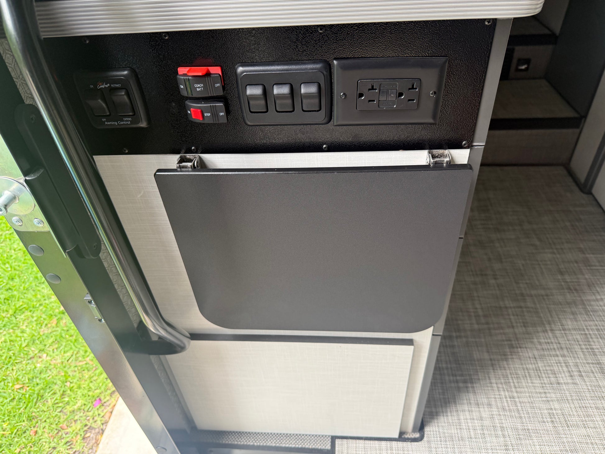 GripTurf black marine‑grade Starboard countertop extension in the EKKO shown in the down position.