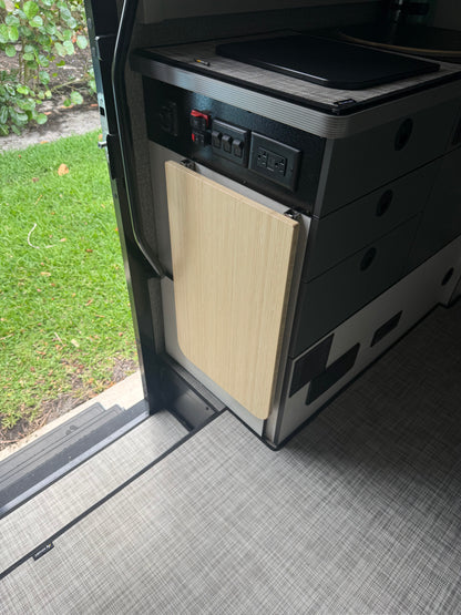 GripTurf 24-inch Natural Bamboo Folding Countertop Extension installed in the Winnebago EKKO, shown in the down storage position.