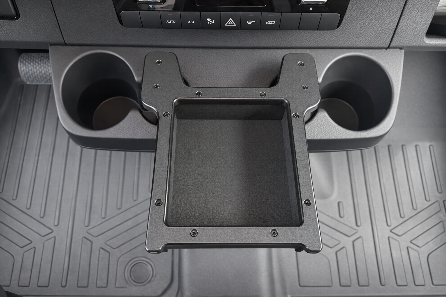 GripTurf Dash Cubby installed in the Sprinter EKKO center console for added storage and organization.