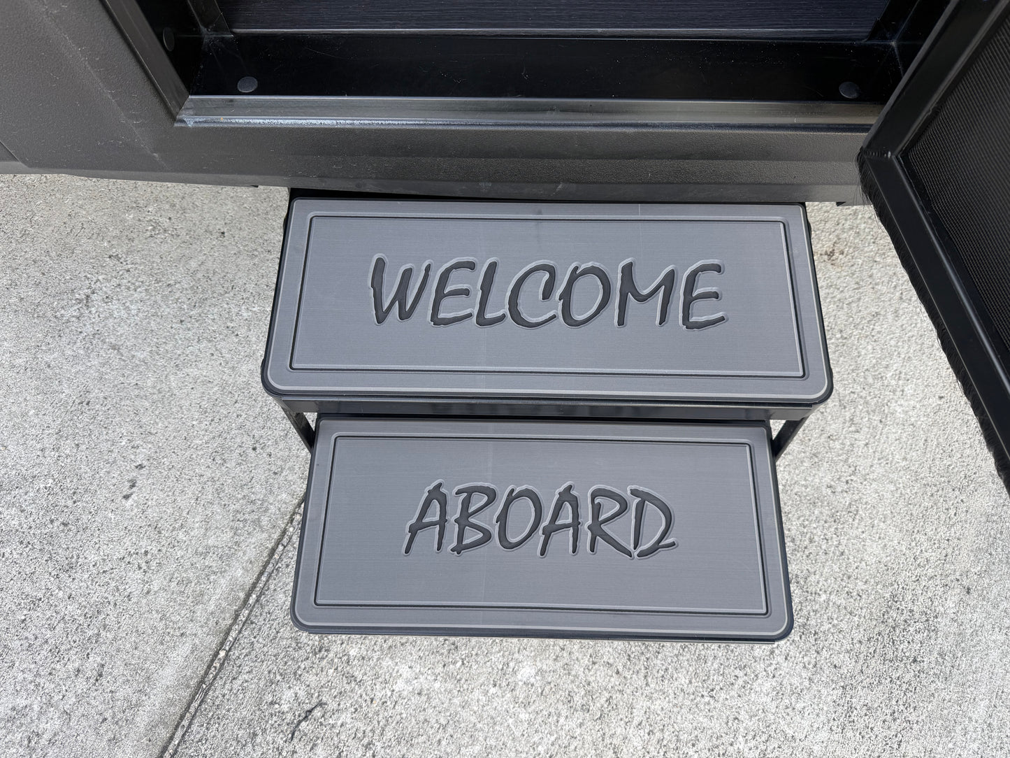 Tiffin Open Trail upgrade step pads with high‑traction grip for safer, improved RV entry