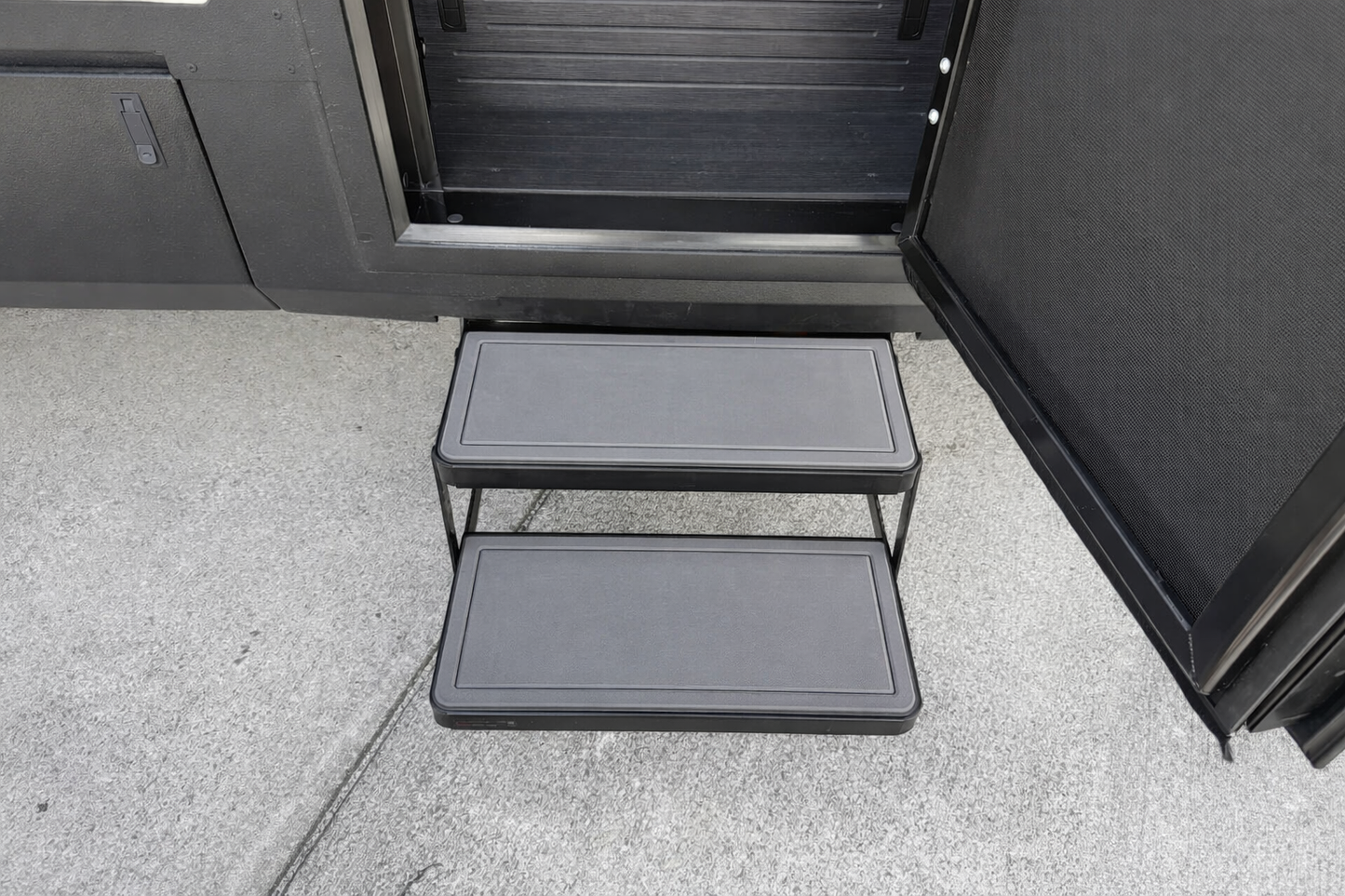  Tiffin Open Trail RV step pads with high‑traction grip installed on entry steps for safer, slip‑free access