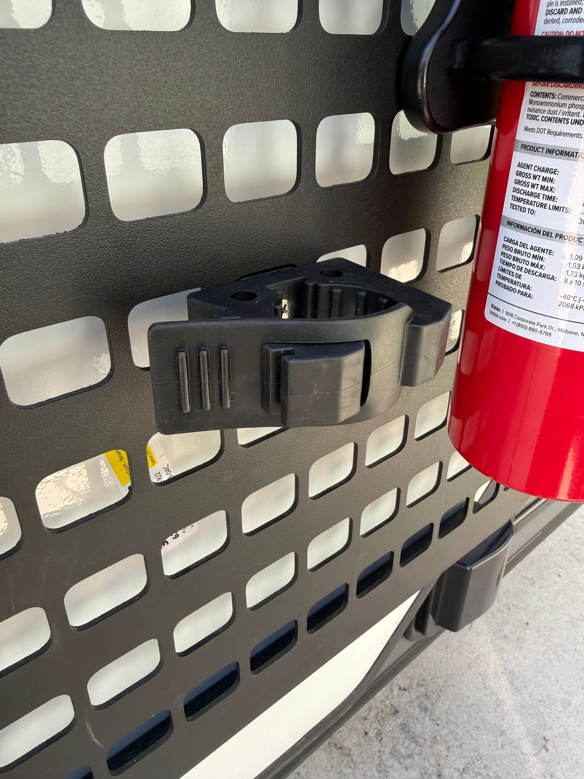 GripTurf 25‑lb rubber tool mount with MOLLE Nut secured on the EKKO MOOLE rack.”
